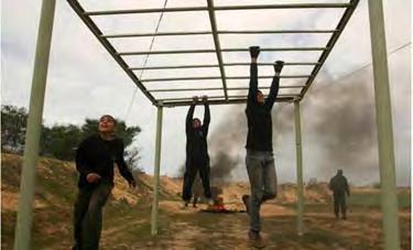 5 Gazan adolescents in military and paramilitary exercises at Hamas winter camps (Hamas forum website, January 23, 2013). 7.