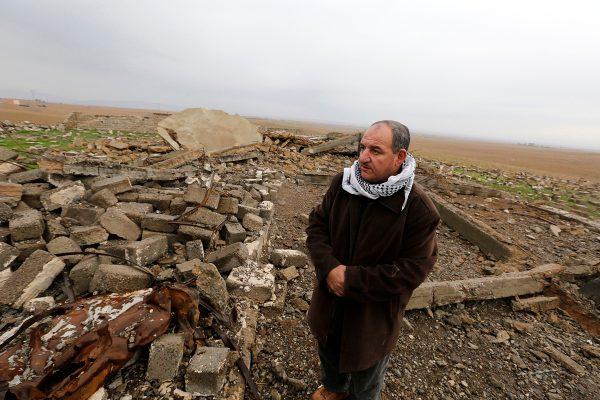 Muhammad Hamed / Reuters Farmer Sami Yuhanna inspects his farm that contains