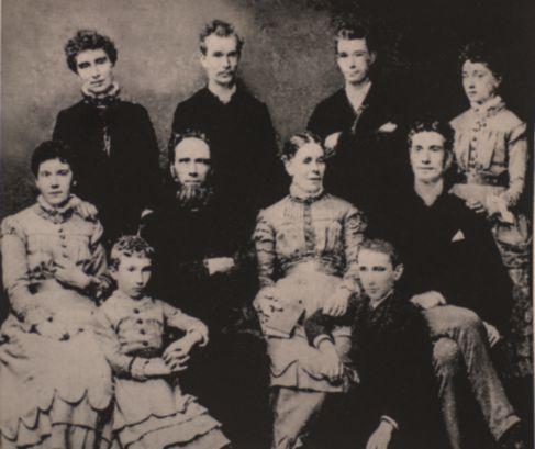 An early portrait of Oswald and his sister Gertrude (right), and (above) the entire Chambers family in the mid-1880s: Clarence and Hannah surrounded by (clockwise from lower left) Florence, Gertrude,