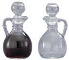 Pitcher used to contain wine for mass Cruets Small glass containers for