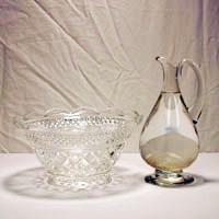 Lavabo Dish or (Finger Bowl) and Water Pitcher The dish that is used for washing the