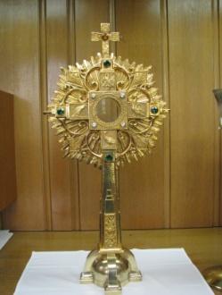 Monstrance this is what is used to hold the host for