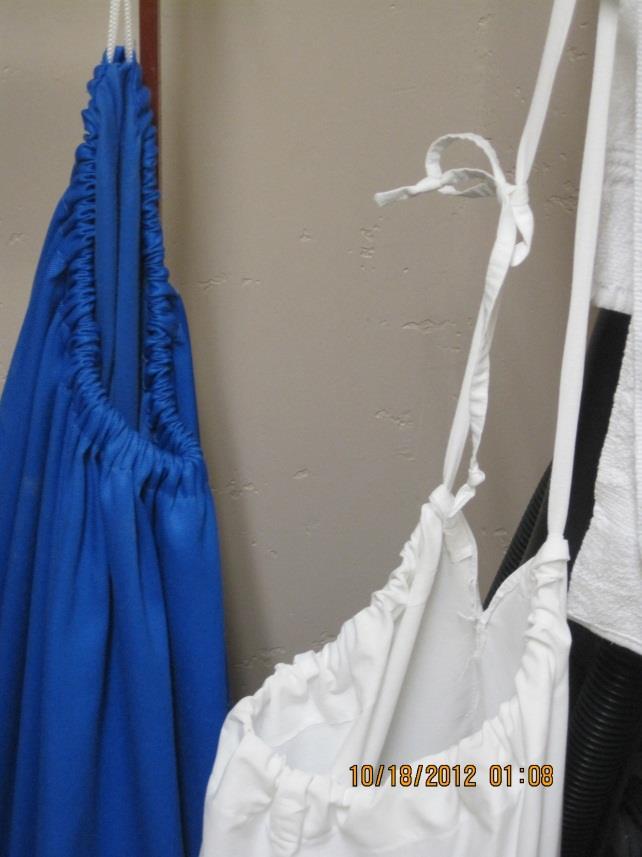 Church Linens: Only unstained altar linens and terry cloth towels are placed in the laundry bag.