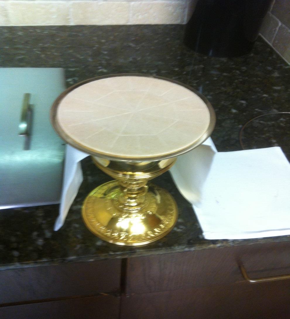 BE CAREFUL CARRYING THE VESSELS FROM THE CREDENCE TABLE TO THE ALTAR.