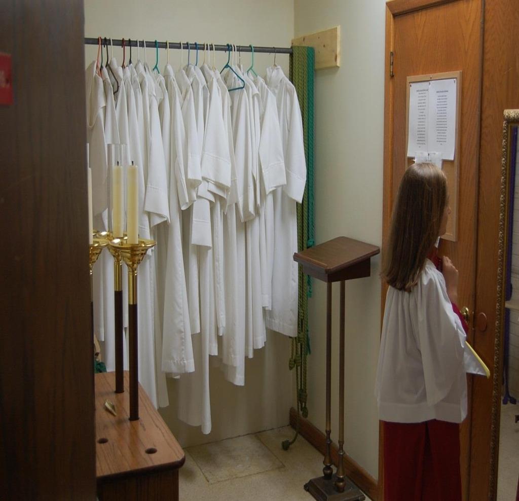 PICTURE B ROOM WITH SERVER VESTMENTS IF AN INEXPERIENCED SERVER NEEDS ASSISTANCE,