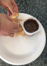 You may have the snack already prepared for children, or give each child a plate with the items needed and allow them make their own Rock Pudding Snack.