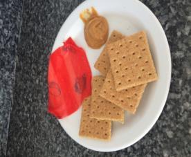 Snack Teaching Guide Snack Day 3 Homes in Haiti Materials/Ingredients: plate, plastic knife, graham or saltine crackers, fruit roll up, pretzel sticks, peanut