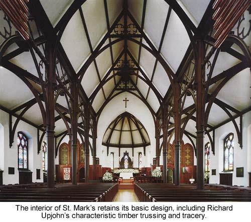 and originally had ventilating cupolas. Doorways and windows were framed in refined cut-stone sills and hood molds. Inside, the church has a basilica plan.