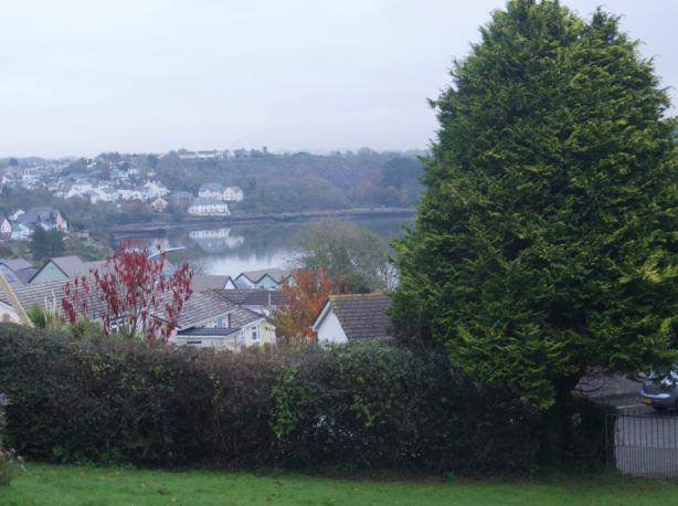 The house boasts outstanding views across Hooe Lake and beyond to Dartmoor