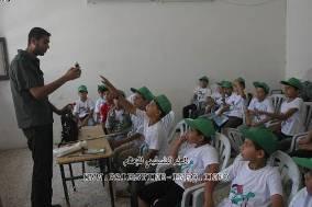 Summer camp run by Hamas-affiliated Dar al-qur an, where segregated groups of young men and women