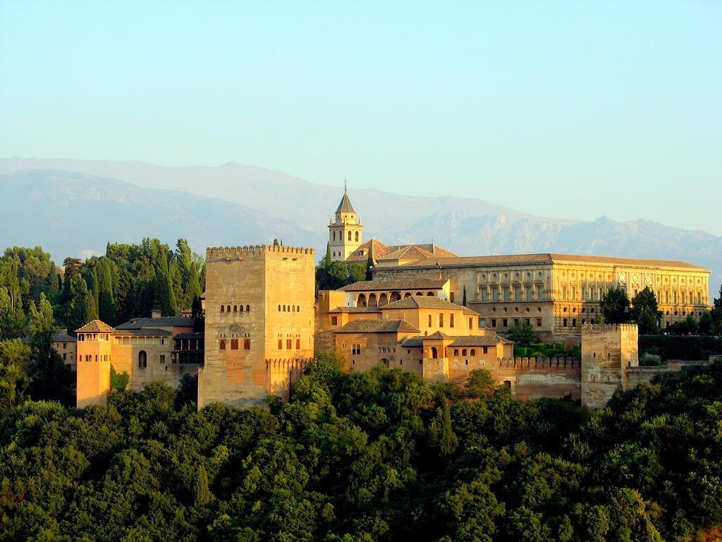 65. Alhambra Granada, Spain Nasrid Dynasty 1354-1391 CE Whitewashed adobe stucco, wood, tile, paint, and gilding Nasrid sultans are last Muslims to rule in Spain.