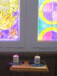 4 On the east wall beneath a window is a small bracket with candles on CDs (Fig.17). This feature recognises the traditional liturgical significance of the east end of the church.