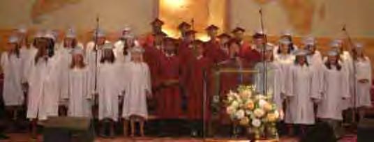 Graduates receiving their diploma from