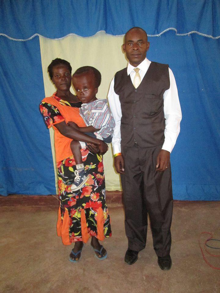 Colletta with her son Delvins and Pastor Erustus. A Pastor s heart is love. This little boy has been sick from an abnormal head disease.