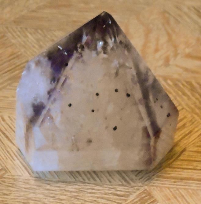It carries the Violet Ray of transmutation and amplifies spiritual energy.