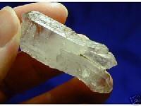 Curved Quartz Crystals Crystals which have a curved shape or which the sides are curved. Produced during the developmental stages, this is a rare occurrence.