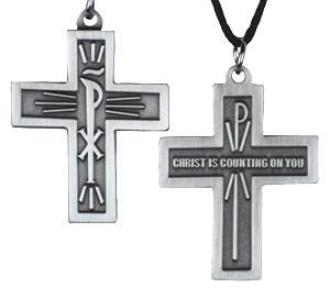 Page 4 Chi-Rho So at community last month I was asked what the symbols on the cross we all wear on our lanyards means.