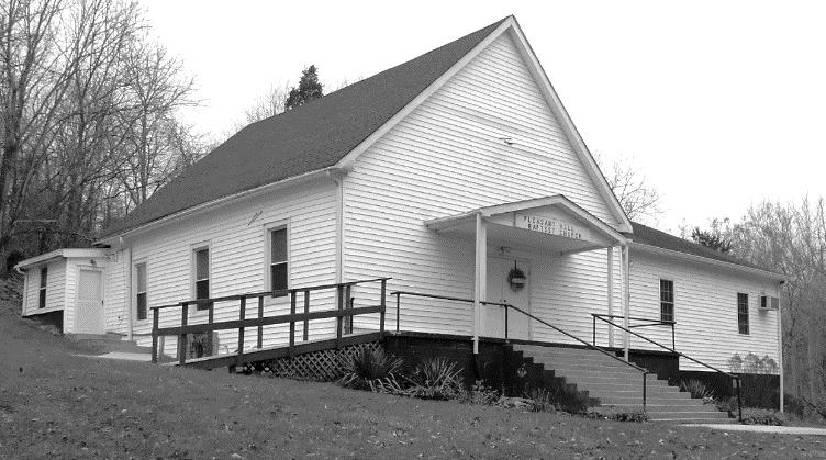 The frame church that burned here in about 1896 was replaced by a larger frame building. In 1957 the latter building was torn down and the present brick church erected on the site.