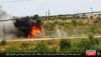 Right: Egyptian Army vehicle just before the IED was detonated against it.