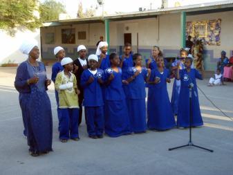 Singing Performance by the Hebrew community (left) & group photo with