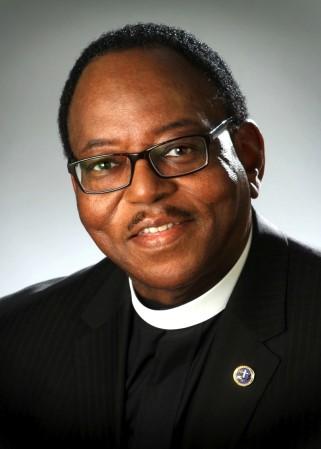 Rev. James E.