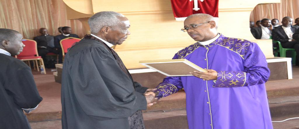 BISHOP PRESENTING A CERTIFICATE OF RECOGNITION TO RETIRED