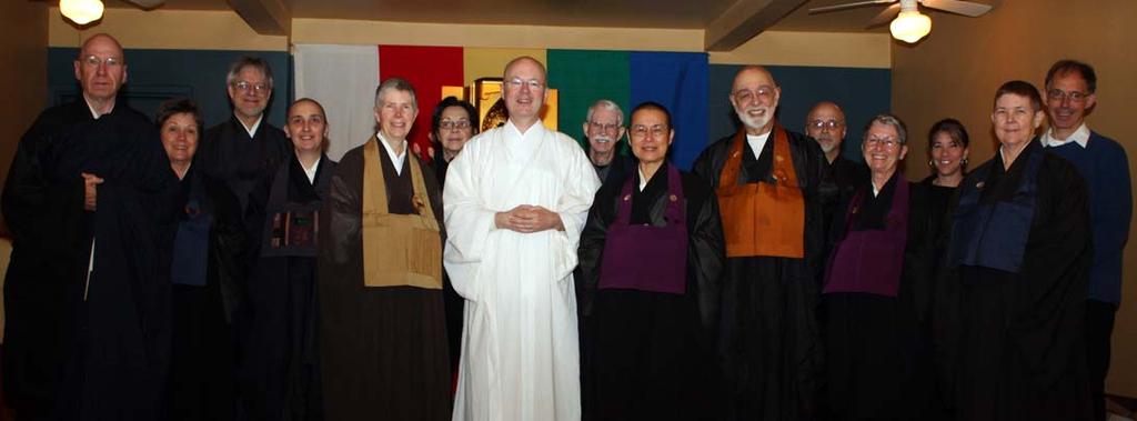 Rites of Passage Above: James Soshin Thornton standing between Roshi Jan Chozen Bays of Great Vow Monastery and Roshi Egyoku, with Sangha members, after dawn Head Shaving Ceremony in preparation for