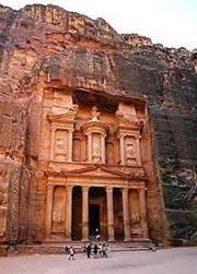 The Treasury, El Khazneh, is one of the most elegant remains of antiquity. Beyond El Khazneh we are surrounded on both sides by hundreds of Petra's carved and built structures.