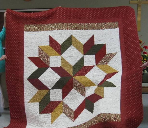 The ladies made this quilt for us in appreciation for the use of Sanderson Hall. Raffle tickets are $1 each or 6 for $5 and are available in the office.