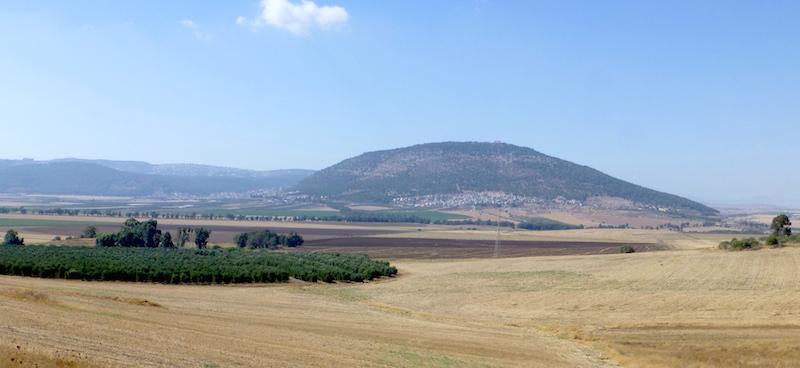 Just down the hill is the spring of Harod where Gideon gathered his troops to thin their number (Jdg 7:1) as he prepared to confront the Midianites in the Valley of Jezreel (photo left; the water