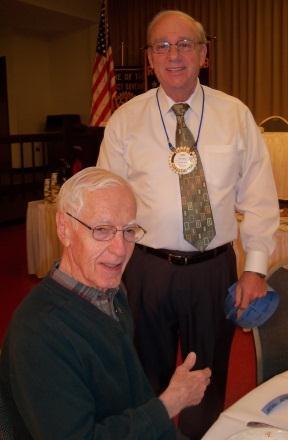 Rotarians at Work and in Fellowship: Rob Glover sold lottery tickets to Mark Sherman Iris Varner was at the door to greet you Hank Campbell helped set up the podium and PA system for President Art