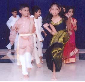 ARRAY OF TALENT TO THE FORE Children performing during the Rajyothsava & Children Day Programme A rich variety entertainment, comprising lilting group songs bewitching dance dramas, Juicy skits laced