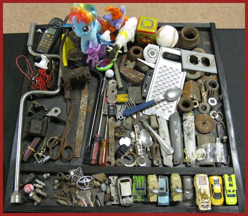 Merriam: Match box cars, toys, keys, files, locks, bolts, etc.