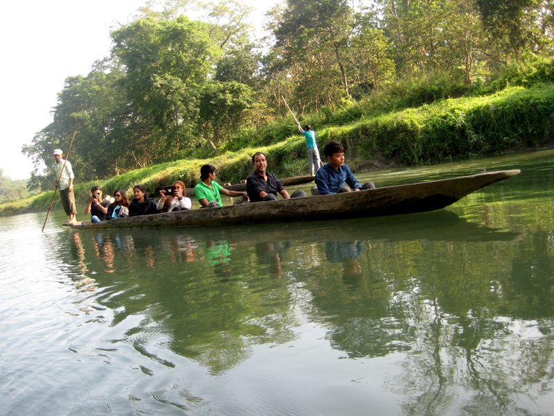 Canoeing At Rapti River On canoe ride along the Rapti River inside the Chitwan National Park and take a close view of crocodiles and