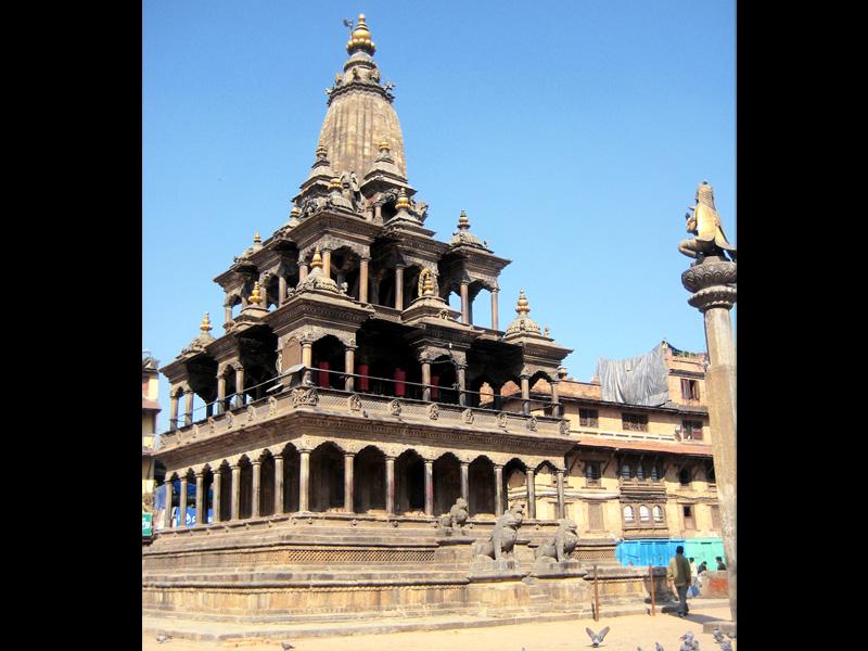 Krishna Mandir(Temple of Krishna) The magnificent Krishna Temple with its 21 gilded spires, built in 1637, and the Manga Hiti, the sunken stone water spout, found in the
