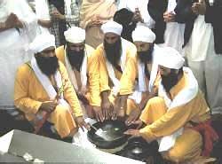 Each of the Panj Pyare will take it in turns to stir the Amrit, using their right hand while at the same time