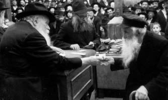 black hat instead of his cap, the Rebbe said that as a Russian he should continue to wear a cap.