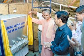 Water Cooler for Pilgrims Visiting Pahari Mandir, Ranchi Swami Smaranananda inaugurates the water cooler donated to Pahari