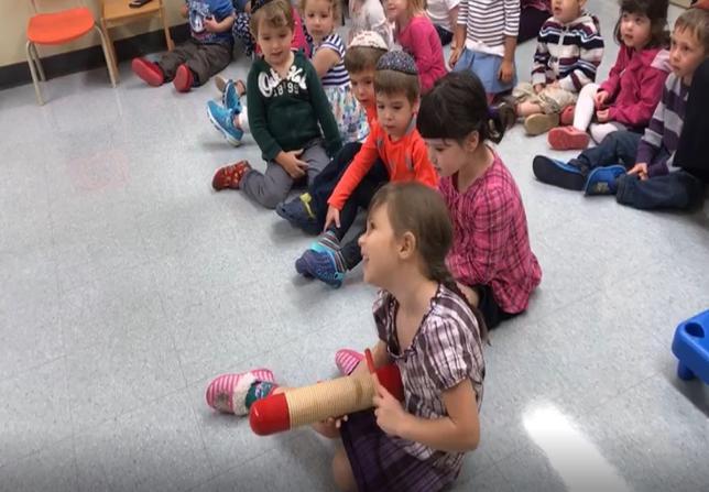 The children love singing and dancing along to the lively Jewish music. It is such a joy to have Dr. Caytak visit every Erev Shabbat.