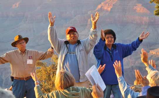 Joe and Gerri Begay, along with Navajo Ministries President Jim Baker (left), lead a sunset worship service at the Grand Canyon during the Navajoland Tour several years ago.