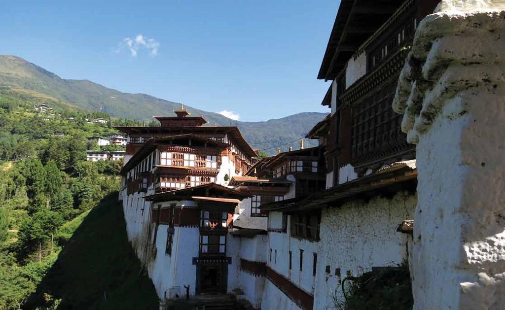 THE HILLS ARE ALIVE THIS PAGE: The Trongsa Dzong, the largest dzong fortress in Bhutan Mist-shrouded trees, and then open vistas, welcomed us as the days passed by, making all too real the saying