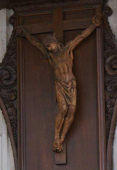 This wood carving is on the Cathedral s pulpit (the raised box near the Dome where the preacher teaches everyone about the Bible in services). Jesus is wearing a crown of thorns on his head.