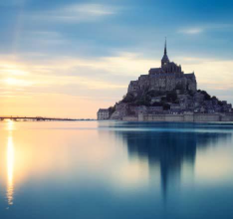 THE MYSTERIOUS CHURCH ON THE EDGE OF THE WORLD by Bishop Robert Barron Even though I lived in France for three years while doing my doctoral studies, I never managed a visit to Mont Saint- Michel,
