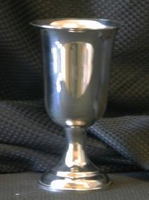 smaller cups used to hold the wine that will become the Blood of Christ during  Their purpose is to