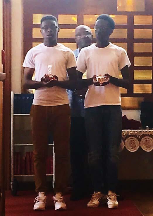 gifts were received by Acolytes Malahkyle and Malik Reid.