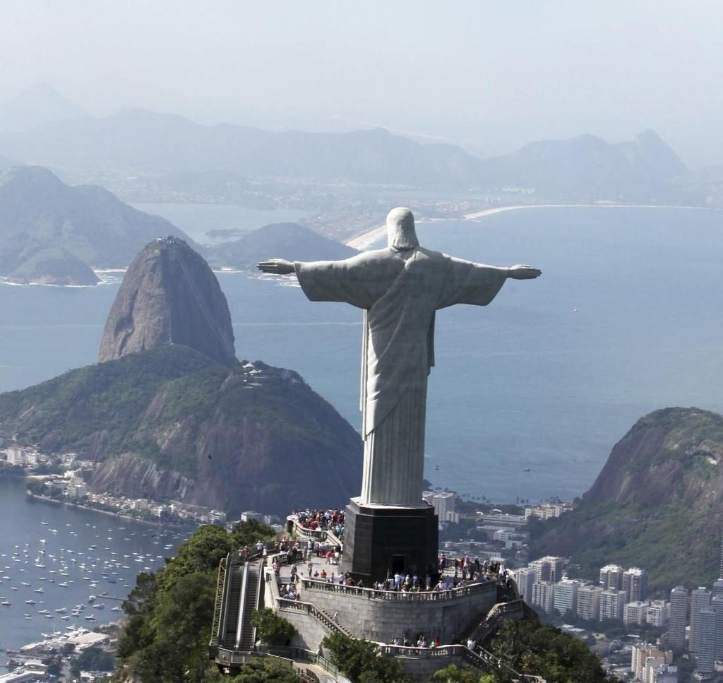 Attached is a photo of the Christ the Redeemer idol in Rio de Janeiro, Brazil. The statue is 98 feet tall, not including its 26 ft pedestal, and its arms stretch 92 feet wide.