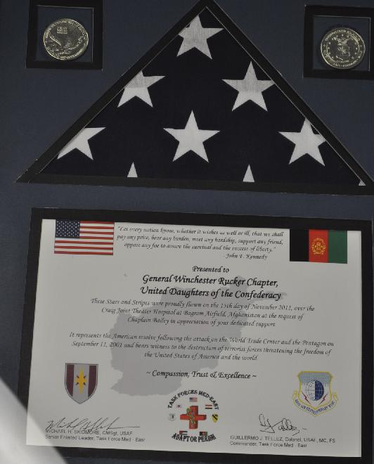 The certificate reads: These Stars and Stripes were proudly flown on the 15 th day of November 2011, over the Craig Joint Theater Hospital at