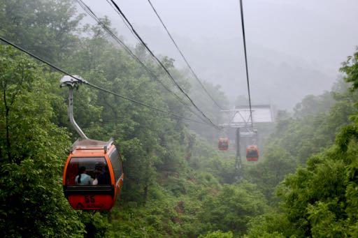 We had to take a cable car up into the mountains since the Great Wall of China rests on top of the mountains.