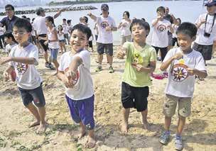 Everyone pitched in for the SG50 Giveback activity with a beach clean up,