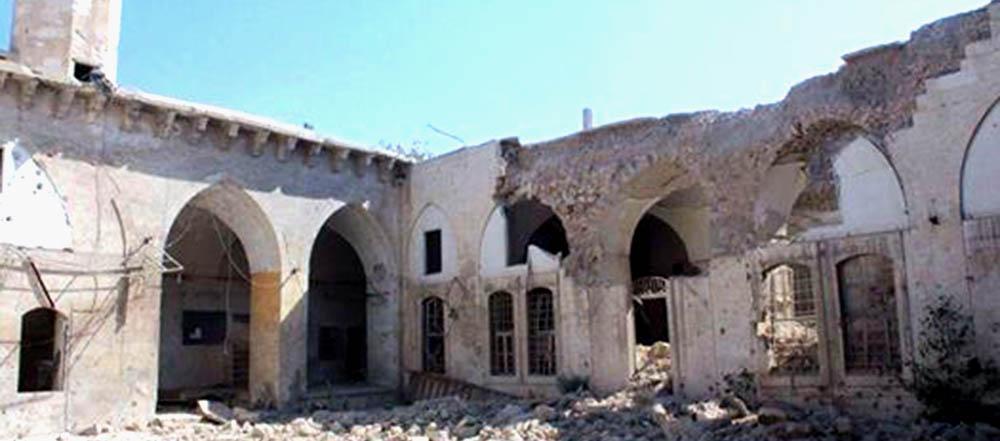On 7 August 2014, a barrel bomb was dropped near Abu Bakr Al- Siddiq mosque in the city of al-bab in the countryside of Aleppo causing serious damage to the mosque.